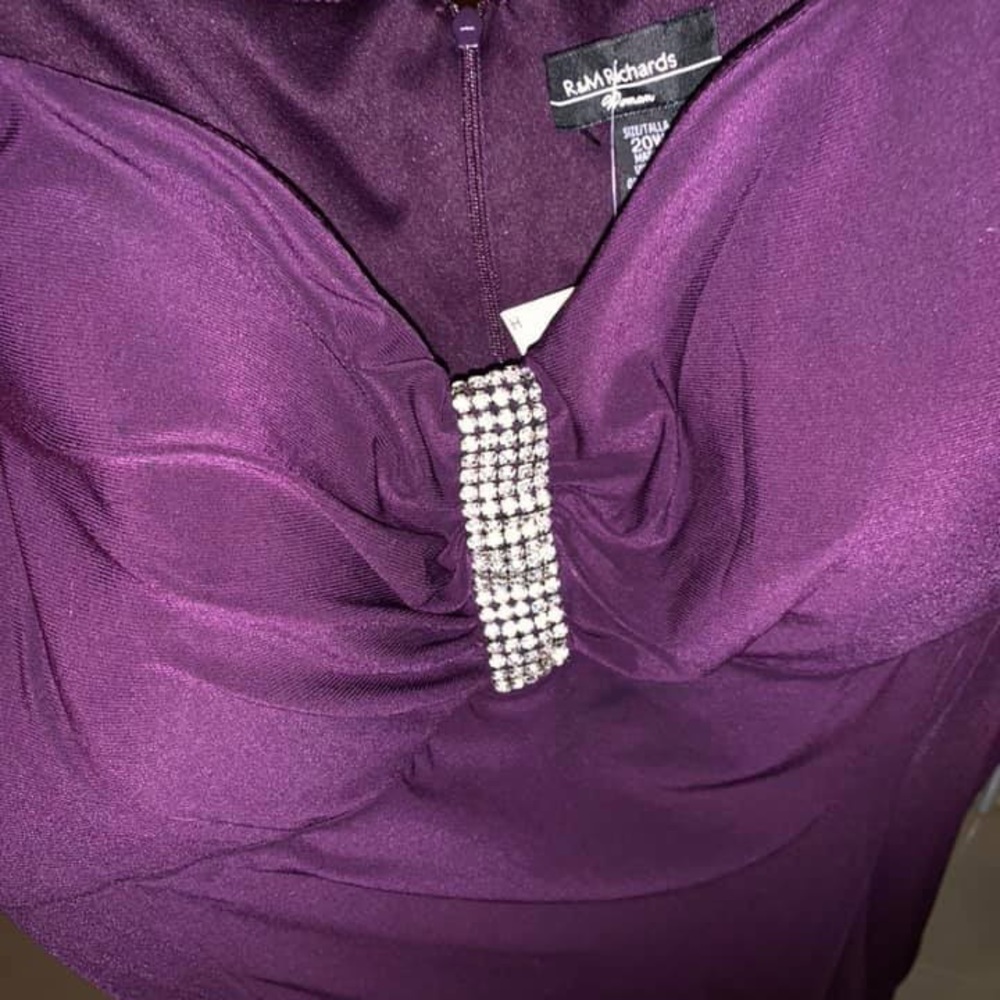 Purple floor length ball Gown